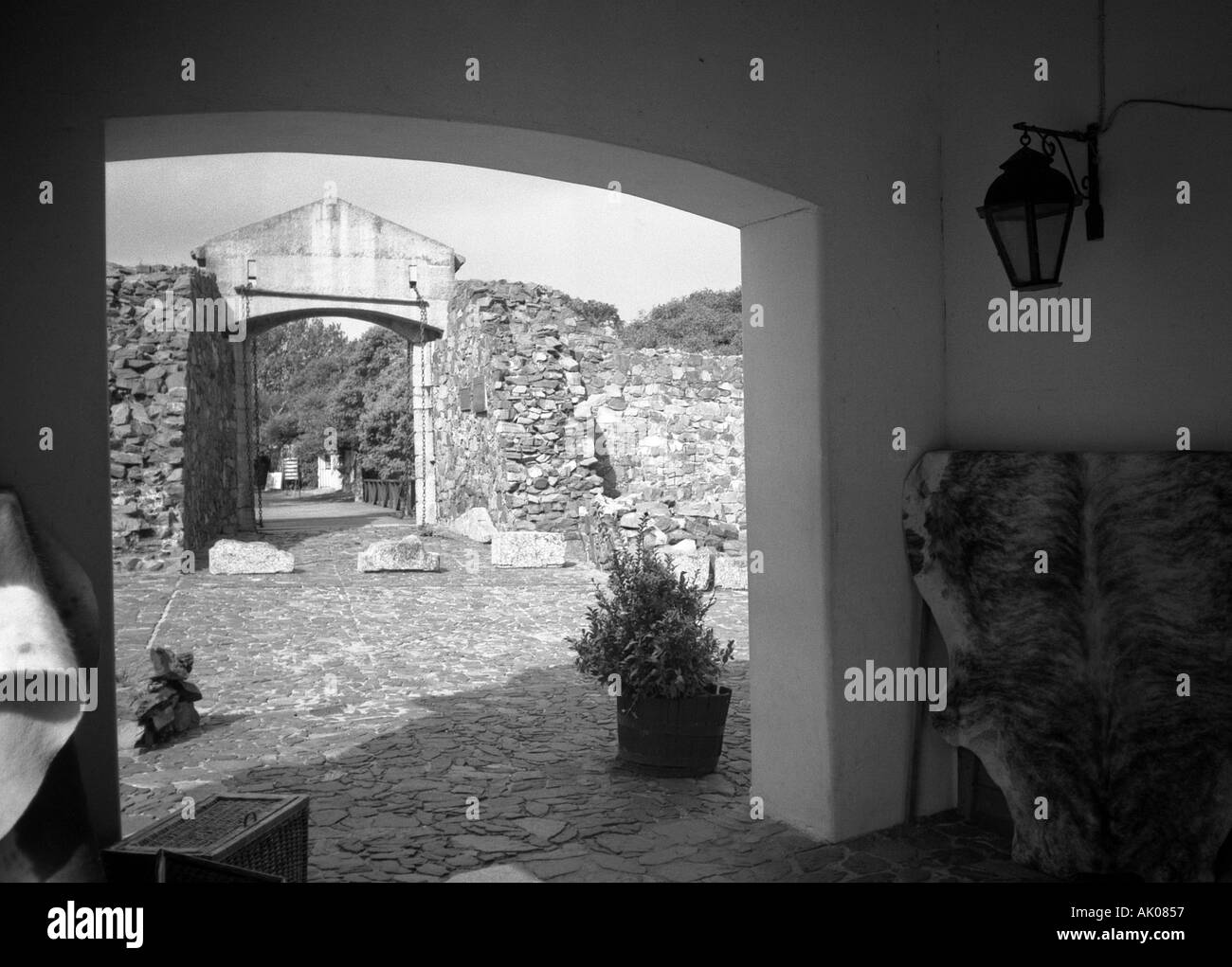 View of characteristic old colonial town through series of stone archways Colonia del Sacramento Uruguay South Latin America Stock Photo