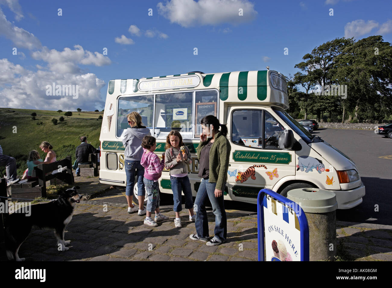 Ice Cream Van with people eating ice creams at Monsal Head Derbyshire Stock Photo