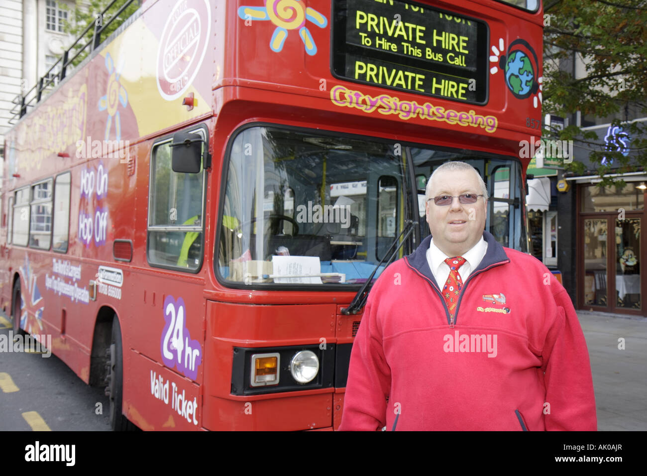 UK England Lancashire,Manchester,St. Peter's Square,double decker red tour bus,coach,driver,UK071006022 Stock Photo