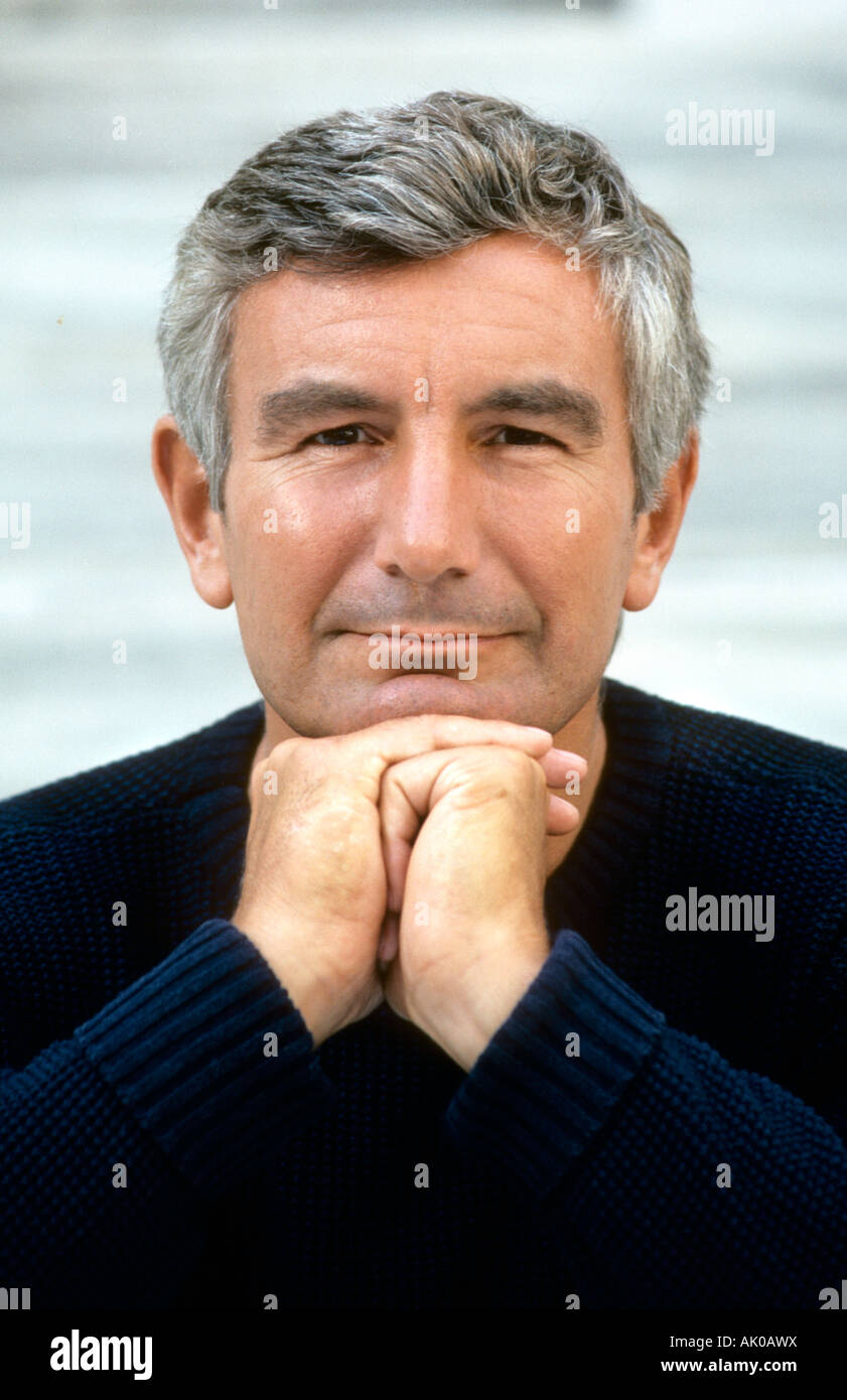 Close Up Portrait Of An Older But Handsome Man With Gray Hair
