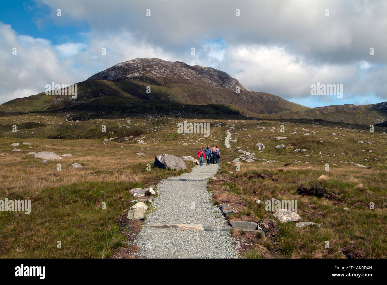 hillwalkers Hikers on a hiking trail on diamond mountain in connemara national park galway west of ireland Stock Photo