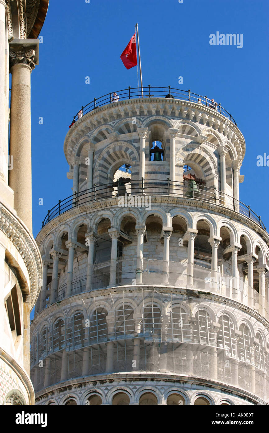 Tourists explore the top of the famous Leaning Tower of Pisa bell tower campanile in Campo dei Miracoli Tuscany Italy Europe Stock Photo