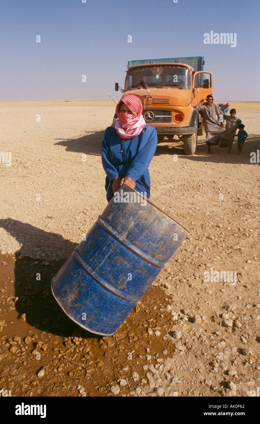 Syrian women with truck in the background portrait Stock Photo