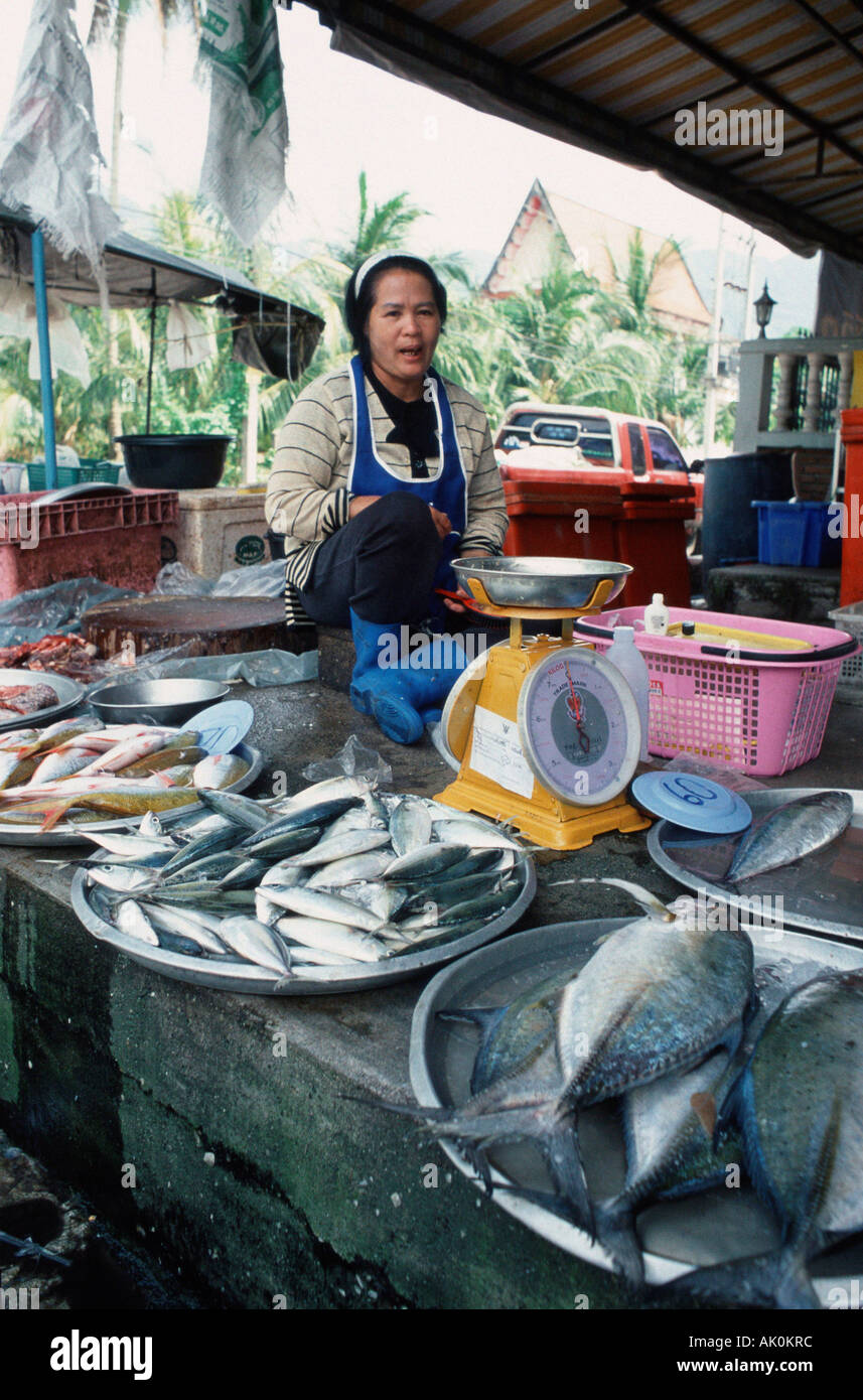 Vendor at fish stall / Phang Nga / Marktfrau an Fischstand Stock Photo