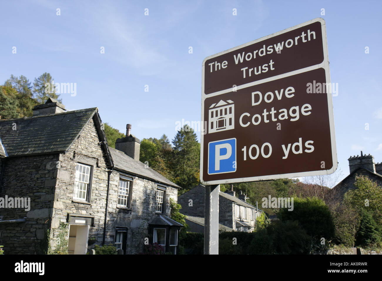 UK England Cumbria,The Lake District,Grasmere,The Wordsworth Trust,William Wordsworth poet,Dove Cottage,sign,UK071010051 Stock Photo
