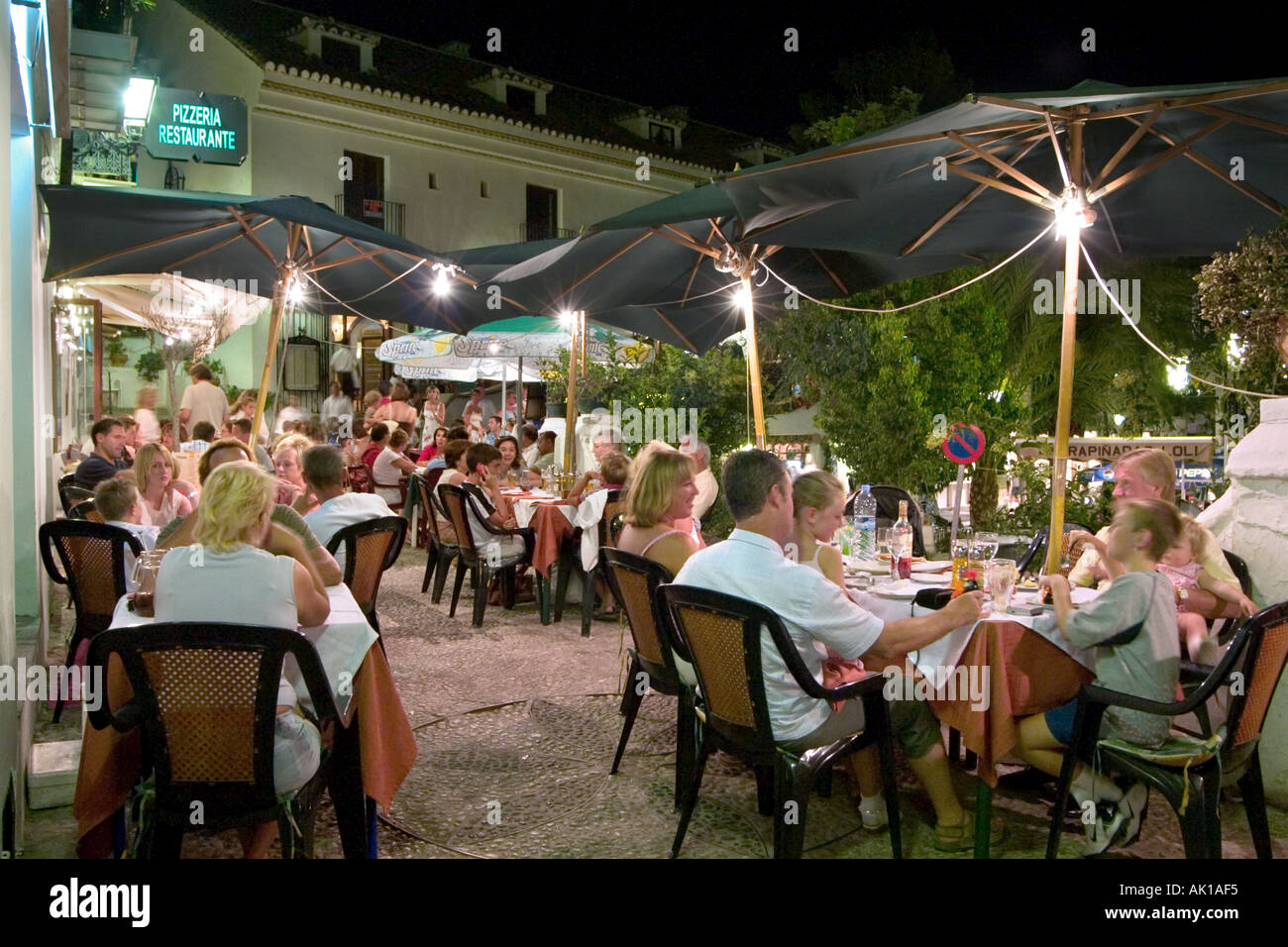 Restaurant at night in the old town, Mijas, Costa del Sol, Andalusia, Spain Stock Photo