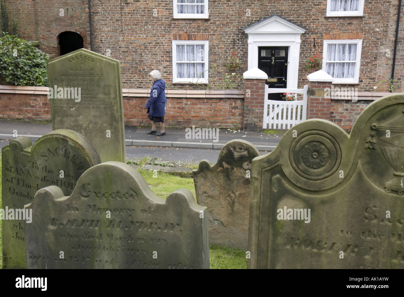UK England North Yorkshire,Thirsk,Cemetery Road,The Parish Church of St. Mary 15th century,graveyard,headstones,UK071013028 Stock Photo