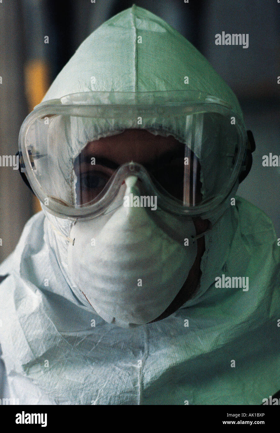 Industry, Manufacturing, Paint production, Man in protective clothing. Stock Photo