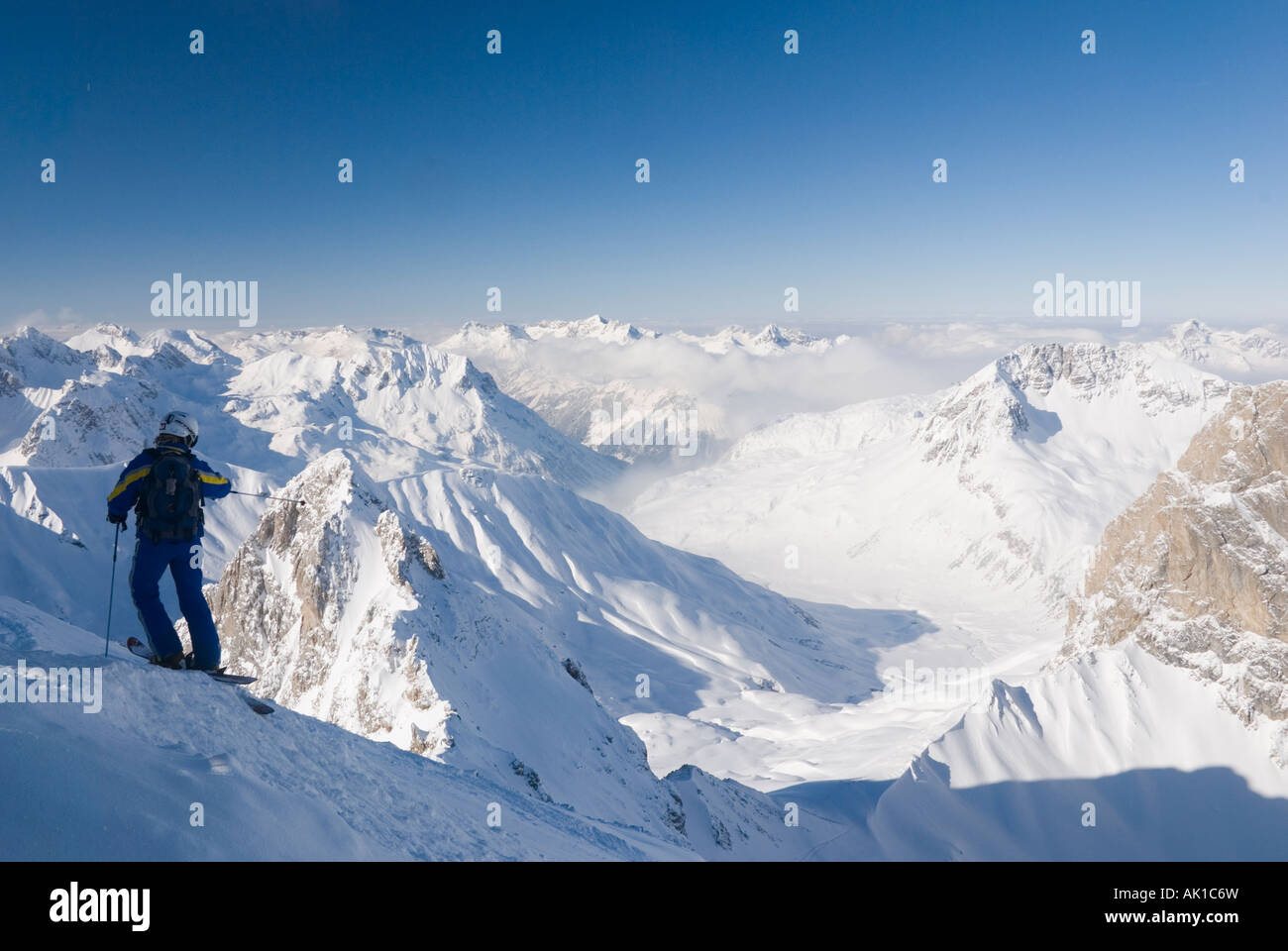 A skier about to drop offpiste off the back of Valluga in St Anton am  Arlberg, Austria Stock Photo - Alamy
