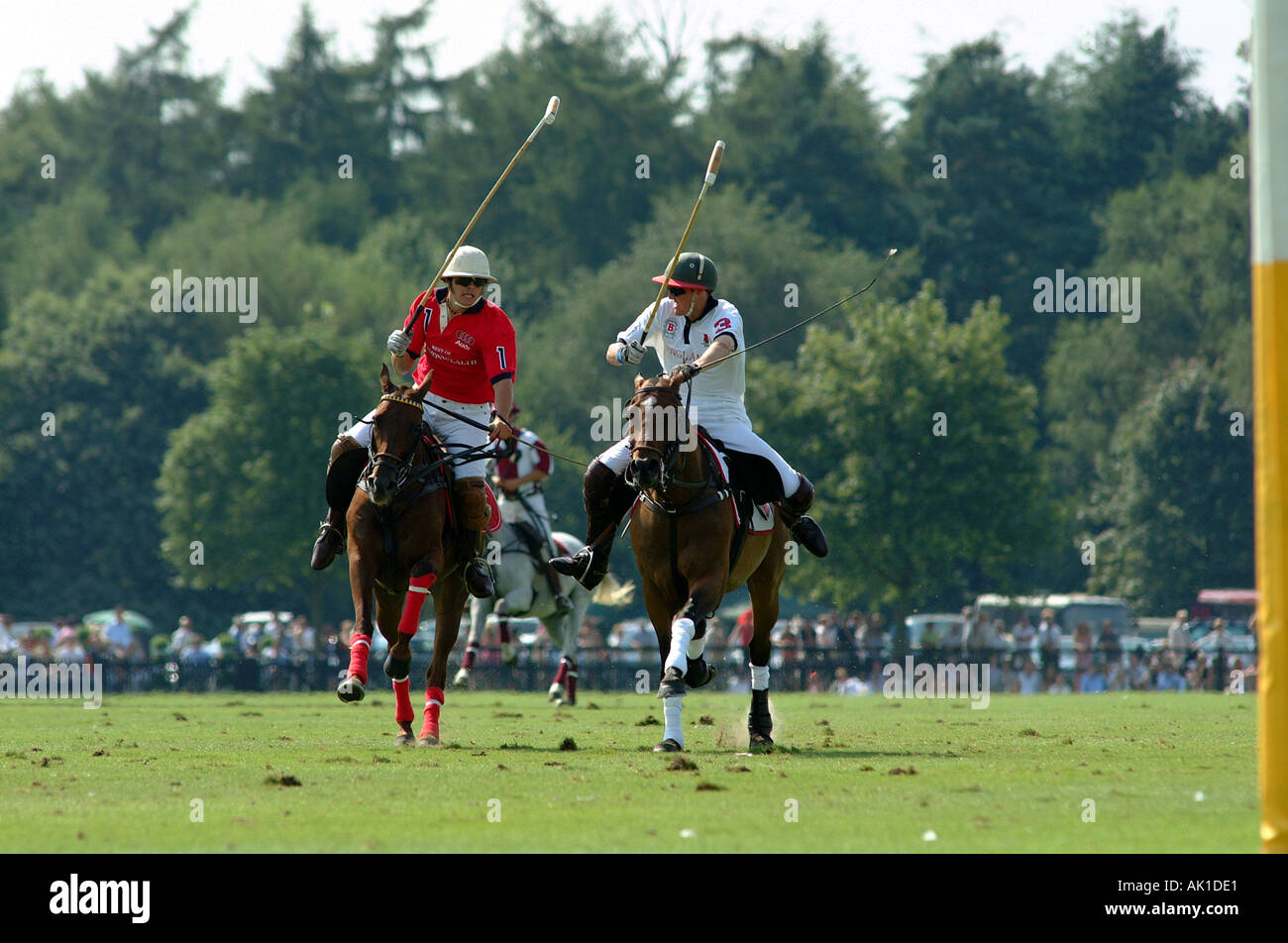 RED NO 1 FRED MANNIX AND WHITE NO 3 LUKE TOMLINSON PLAYING AT CARTIER INTERNATIONAL DAY,GUARDS POLO CLUB Stock Photo