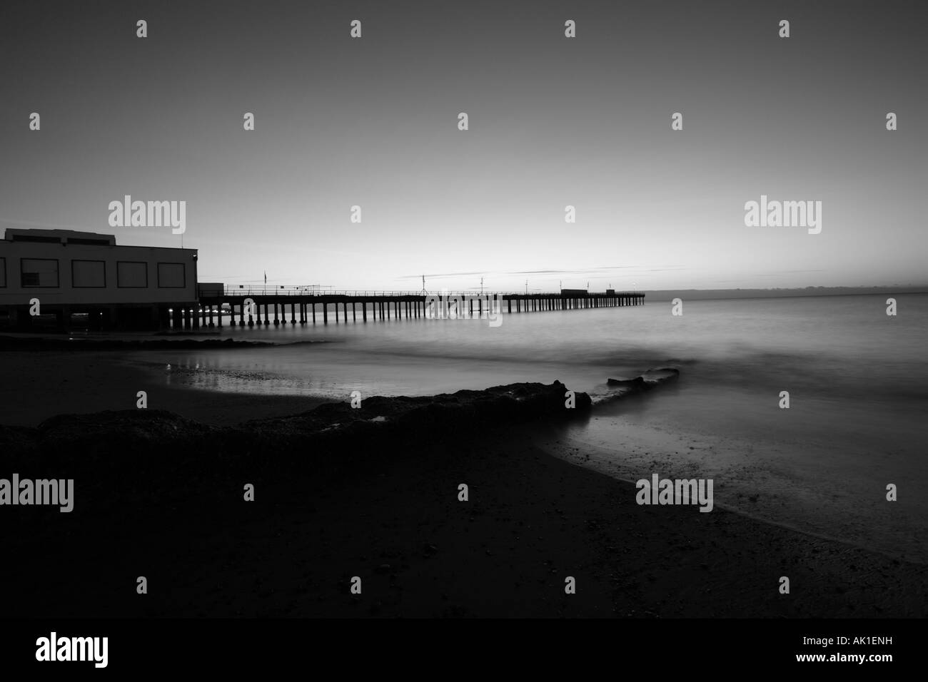 Felixstowe beach and pier at dawn. Stock Photo