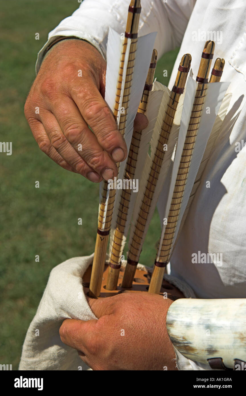 Closeup of armour piercing arrows as used with traditional wooden longbow being inserted in quiver Stock Photo