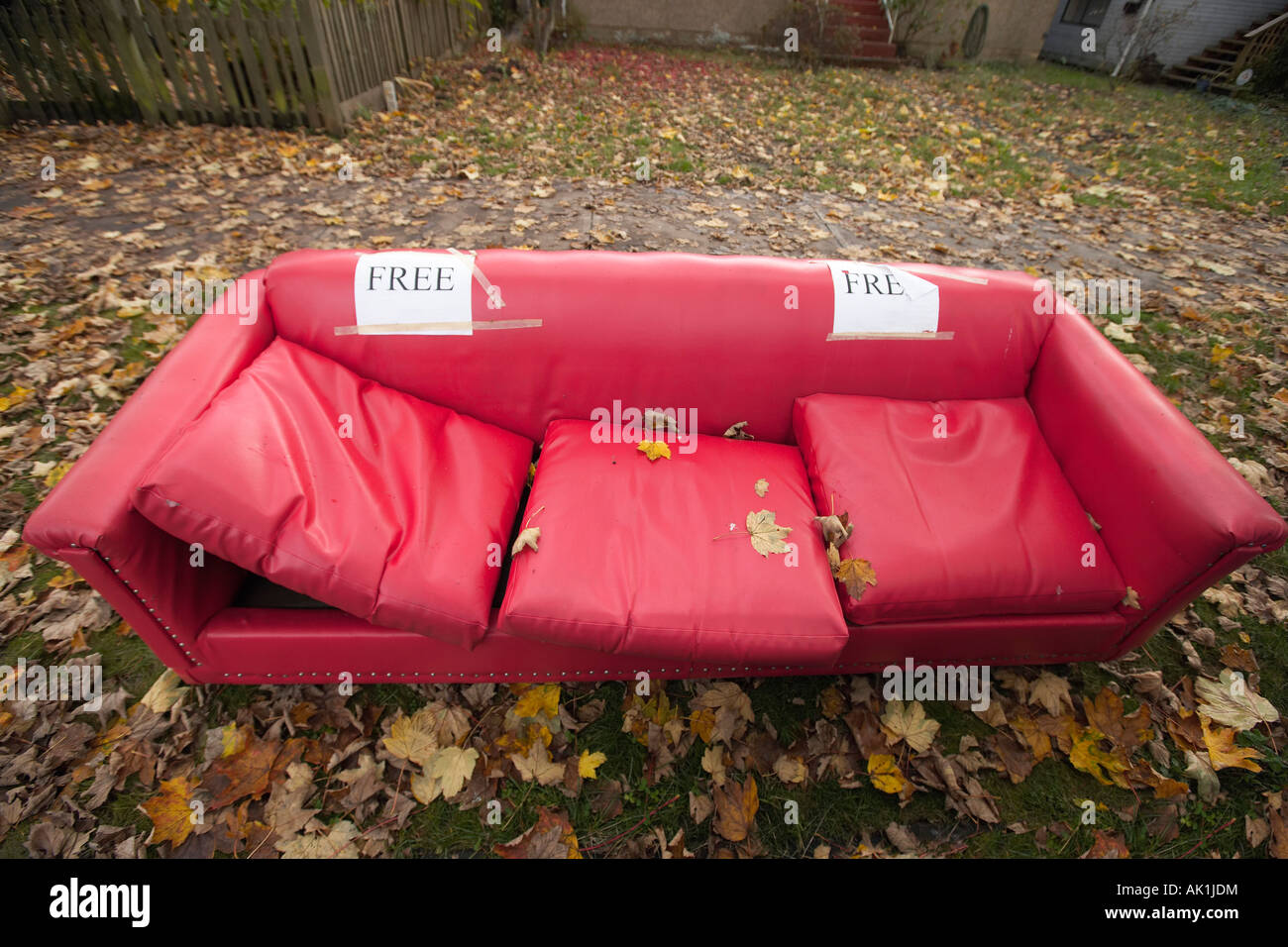 Free sofa left by sidewalk Stock Photo Alamy