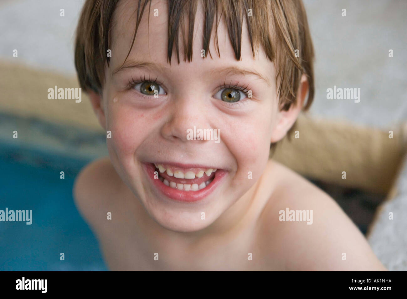 Happy Three Year Old Smiling By An Indoor Swimming Pool Stock Photo Alamy happy-three-year-old-smiling-by-an-indoor-swimming-pool-stock-photo-alamy