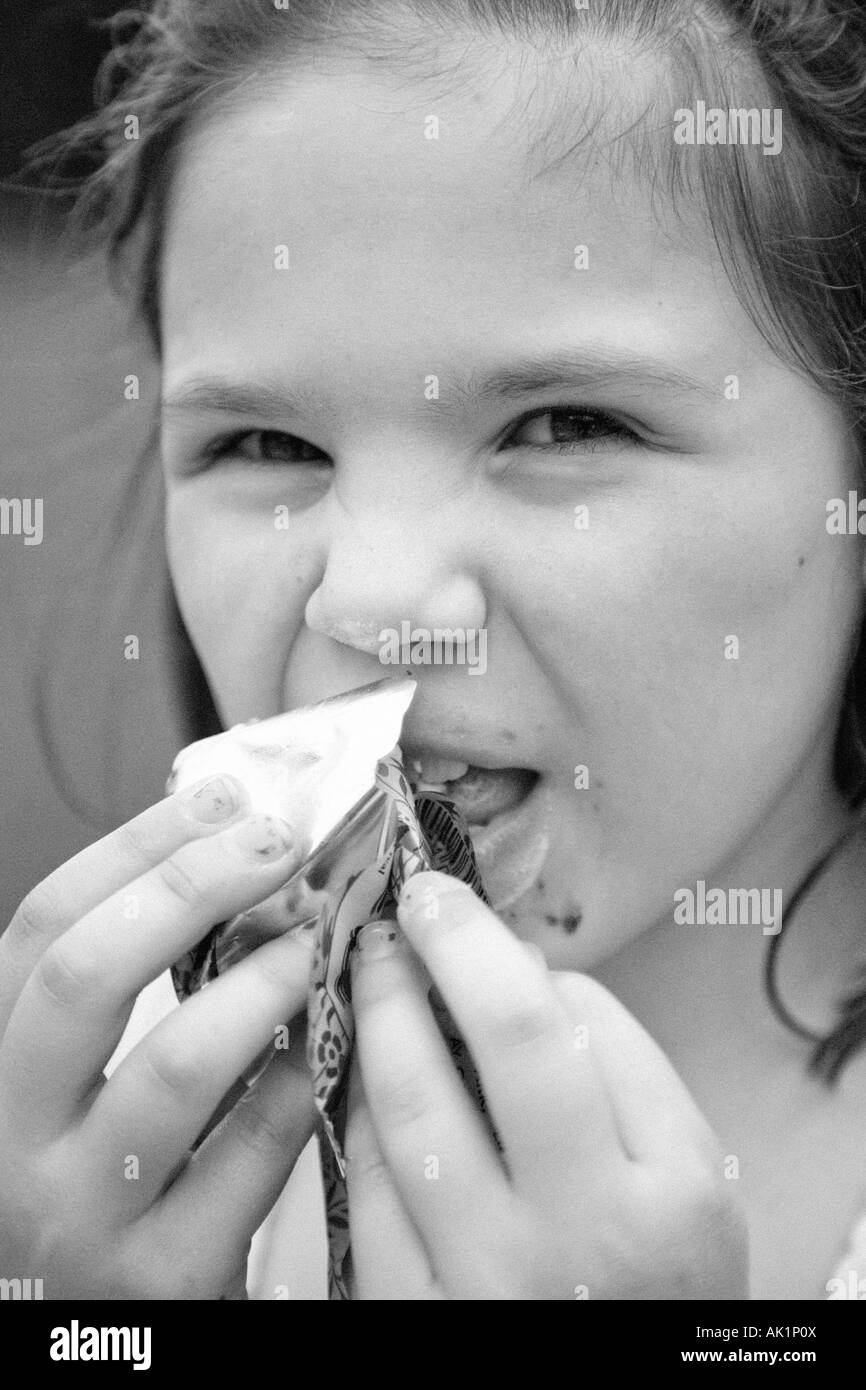 Fat girl eating ice cream Black and White Stock Photos & Images Alamy