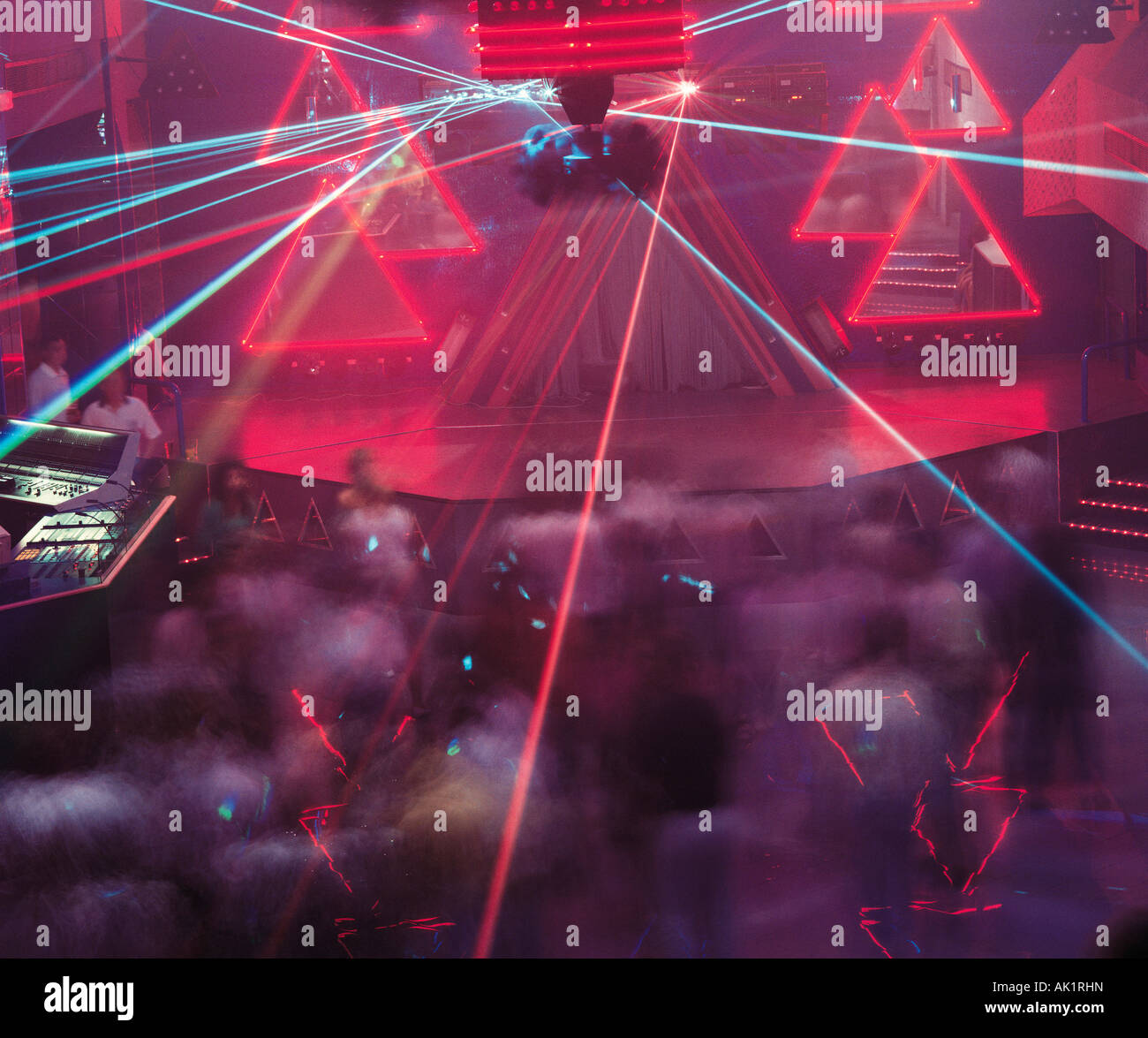England. London. Laser light show and people dancing at The Qube Project nightclub. Stock Photo