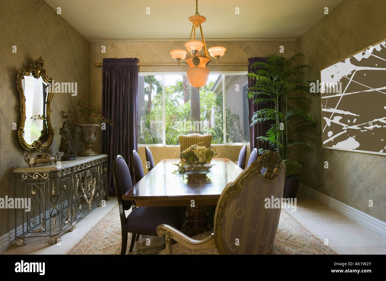 Elegant Dining Room with Purple Chairs Stock Photo - Alamy
