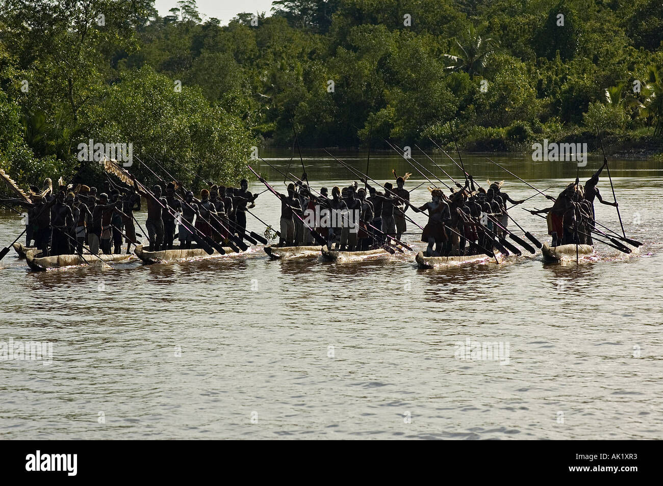 Canoe war ceremony of Asmat people, Irian Jaya Indonesia. Stock Photo