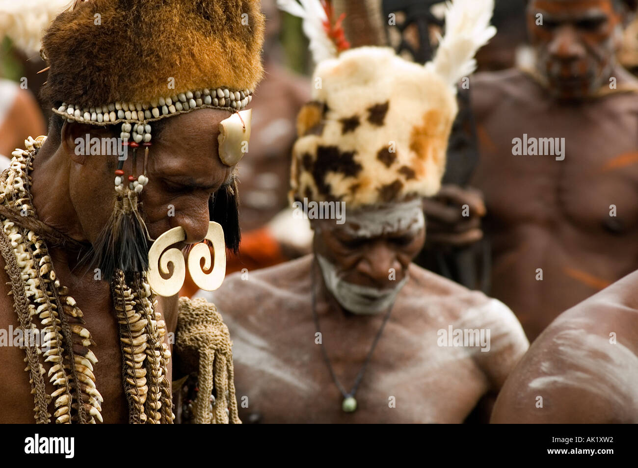 Asmat tribal men in killing evil soul ceremony, Omandeseb, Irian Jaya Indonesia. Stock Photo