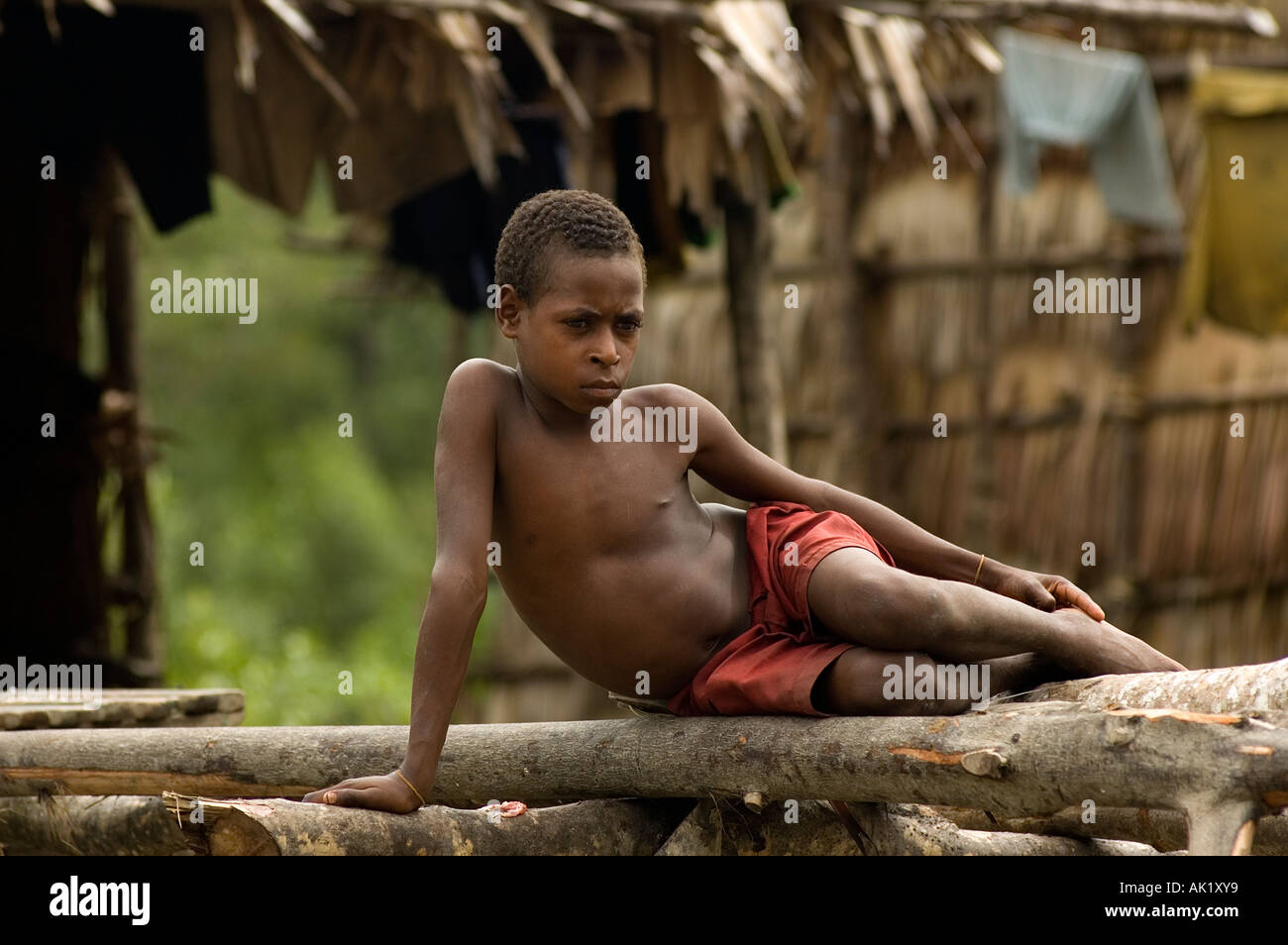 Asmat boy in Irian Jaya, Indonesia. Stock Photo