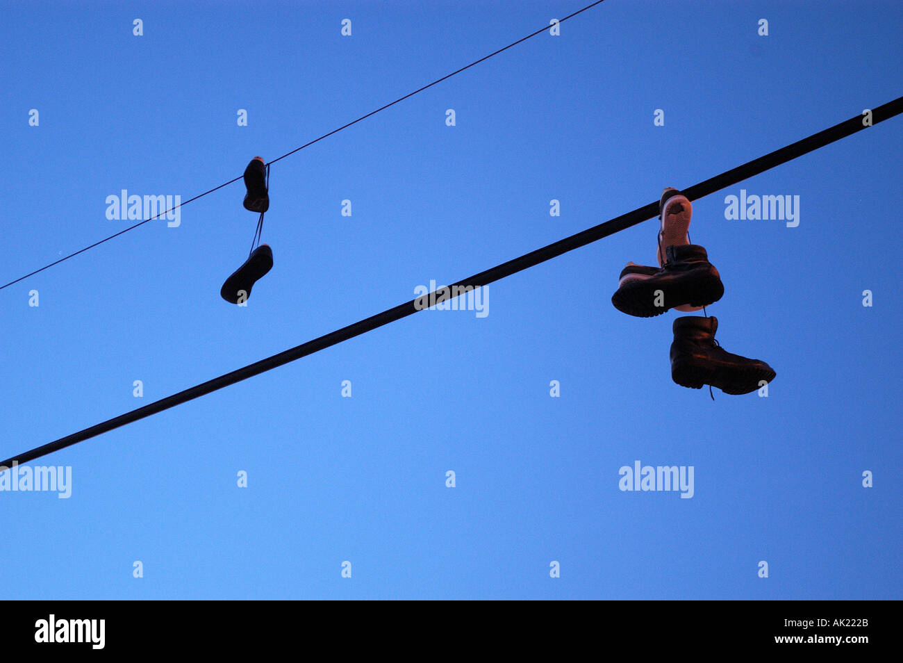 Shoes hanging on wire cables in Bronx Stock Photo Alamy