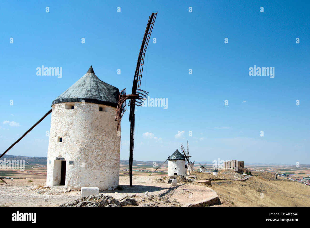 Don Quixote windmills. Famous windmills in Consuegra, Castilla-La-Mancha, Spain - setting for the novel El ingenioso Hidalgo don Quixote de la Mancha Stock Photo