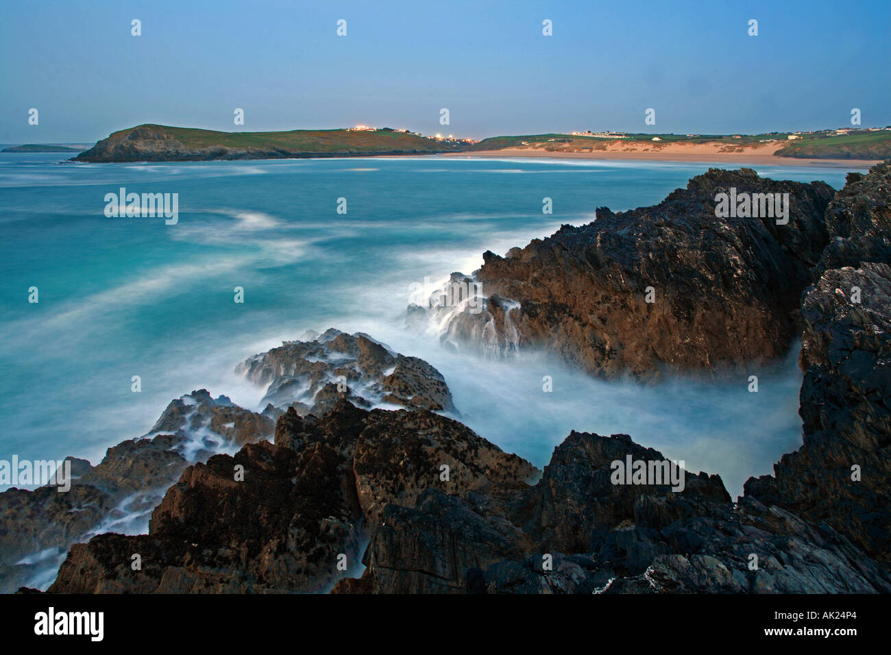 view from west pentire to Newquay and Crantock beach at dusk cornwall Stock Photo