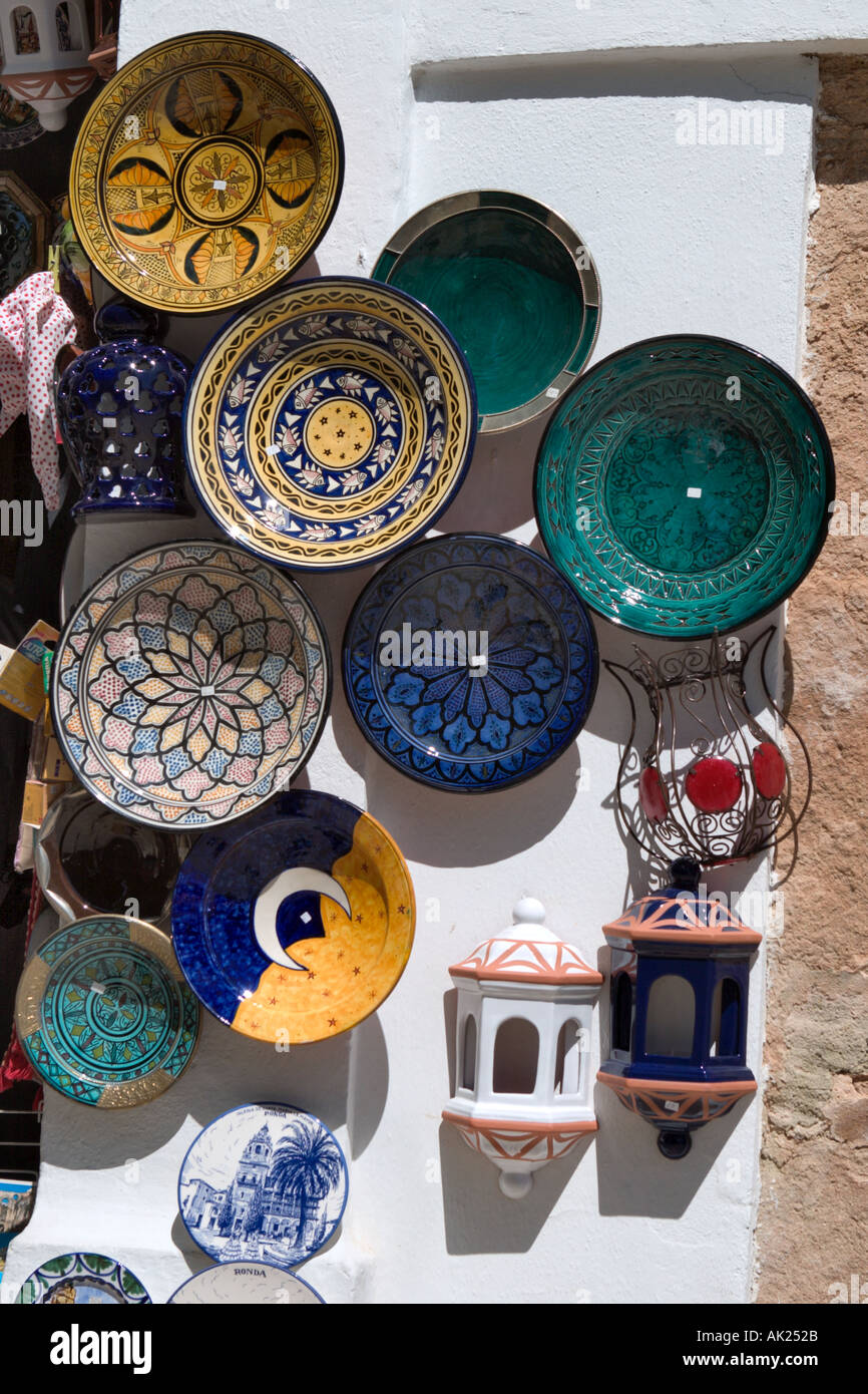 Plates on the wall outside a pottery shop, Ronda, Andalucia, Spain Stock Photo