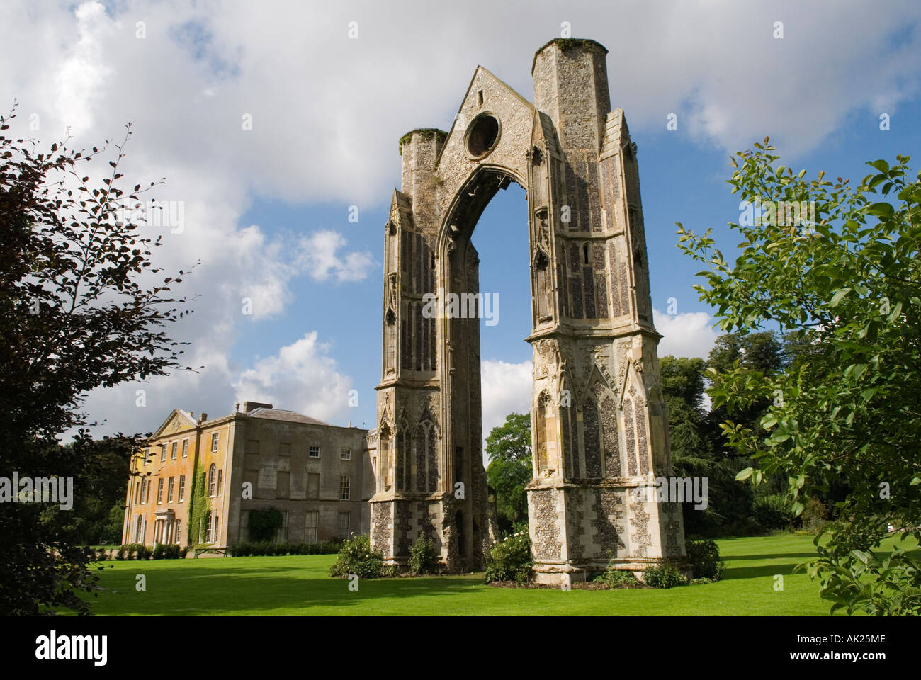 Abbey Manor House and the  Abbey ruin. Little Walsingham North Norfolk England  East Anglia UK 2006 2000s HOMER SYKES Stock Photo
