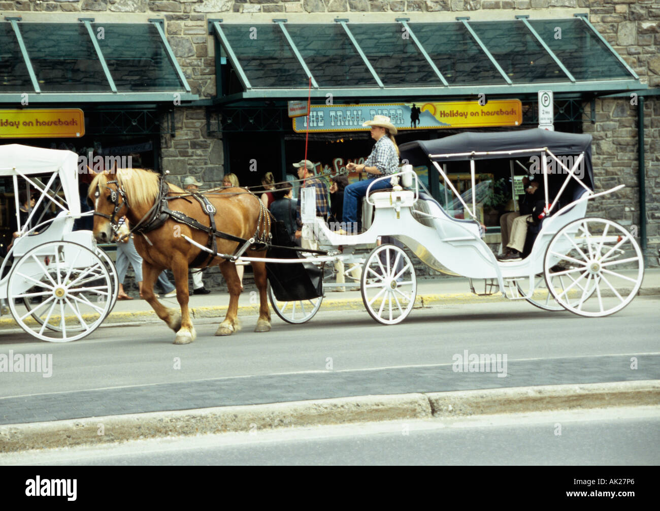 BANFF Alberta Canada JUNE One of the horse drawn carriages which take