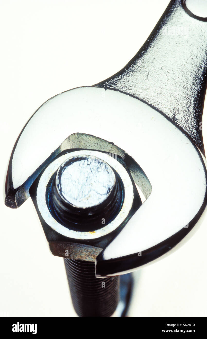 Wrench tightening a nut Stock Photo Alamy