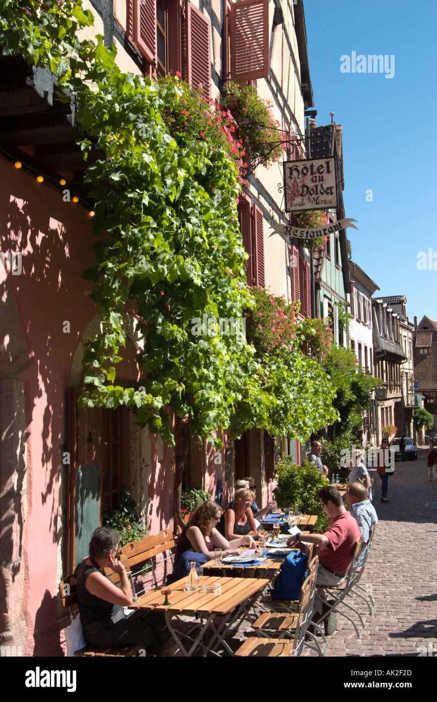 Restaurant in the old town centre, Riquewihr, Alsace, France Stock Photo