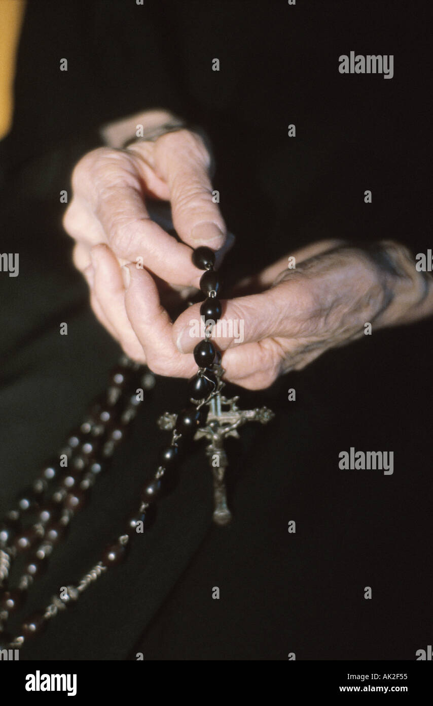 Rosary in hand hi-res stock photography and images - Alamy