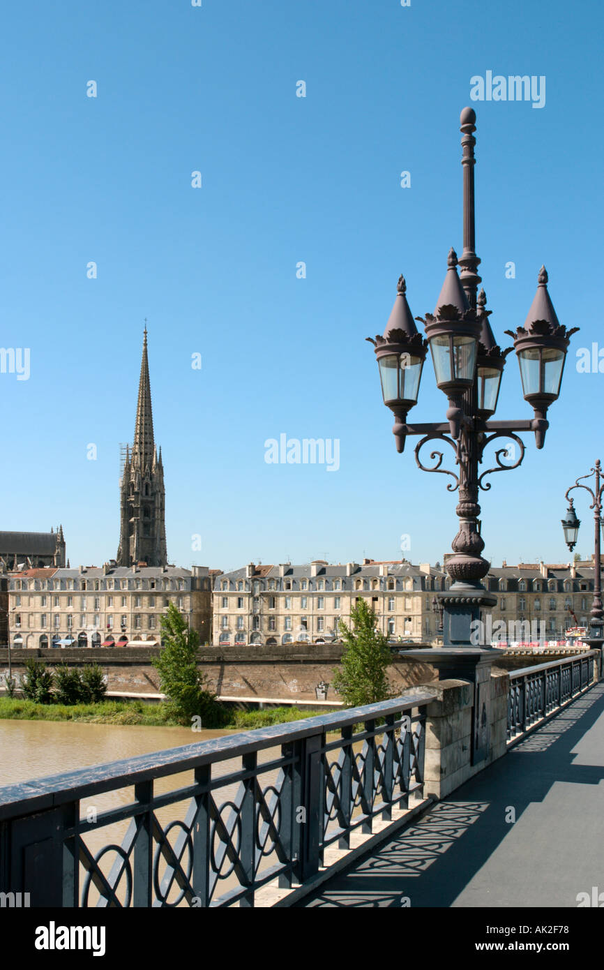 Pont de Pierre and the steeple of the church of St Michel, River Garonne, Old Town, Bordeaux, Aquitaine, France Stock Photo