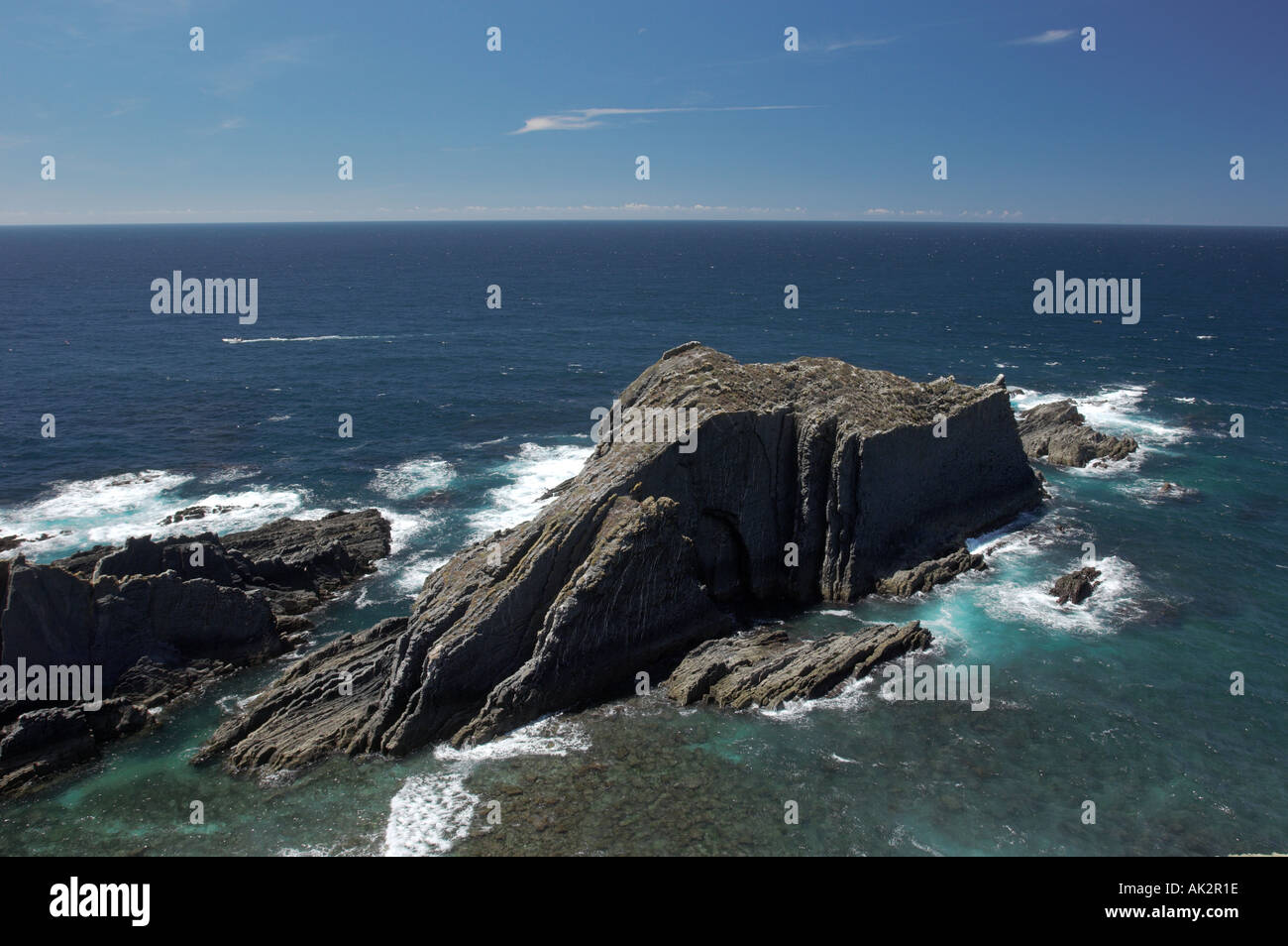 sea waves breaking against rocks Stock Photo - Alamy