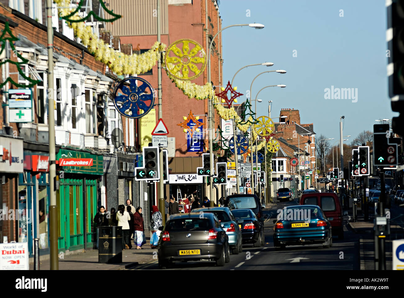 belgrave road in Leicester this is a famous long street in Leicester home to many asian book stores music and eating places with Stock Photo