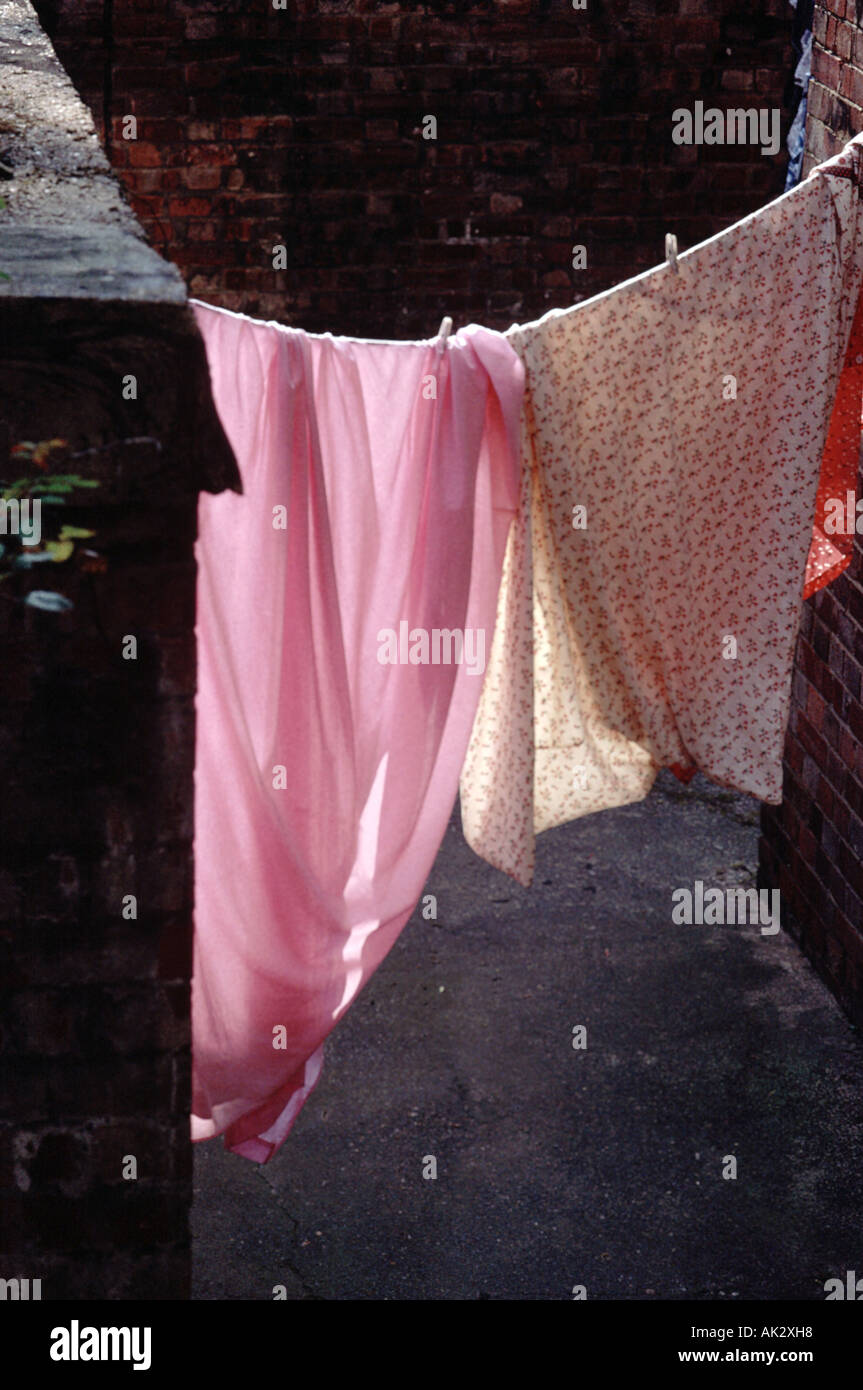 sheets hanging from a washing line Stock Photo Alamy