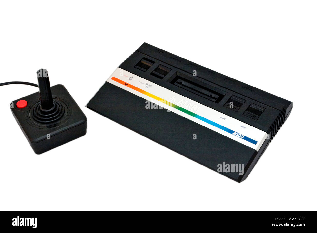 Late model Atari Video Computer System 2600 VCS Junior games console plus original black joystick with bright red button Stock Photo