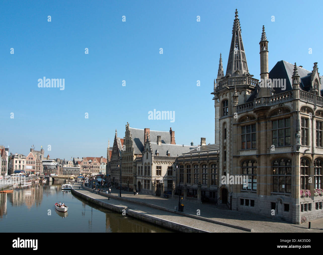 View from the St Michielsbrug bridge of the Graslei and Korenlei with the Oude Postgebouw (post office) on right, Ghent, Belgium Stock Photo