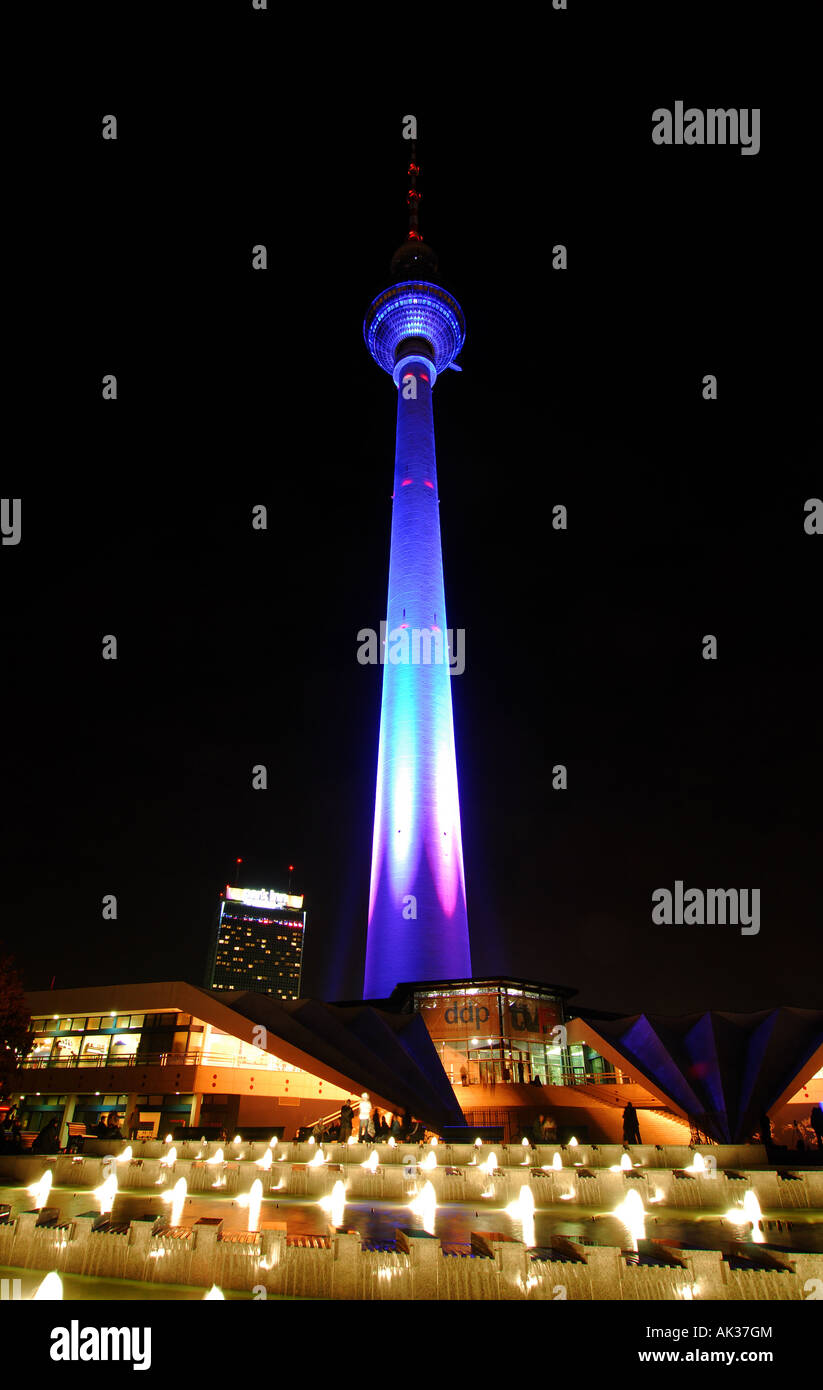 Alexanderplatz Television Tower colourfully illuminated at night, Berlin Stock Photo