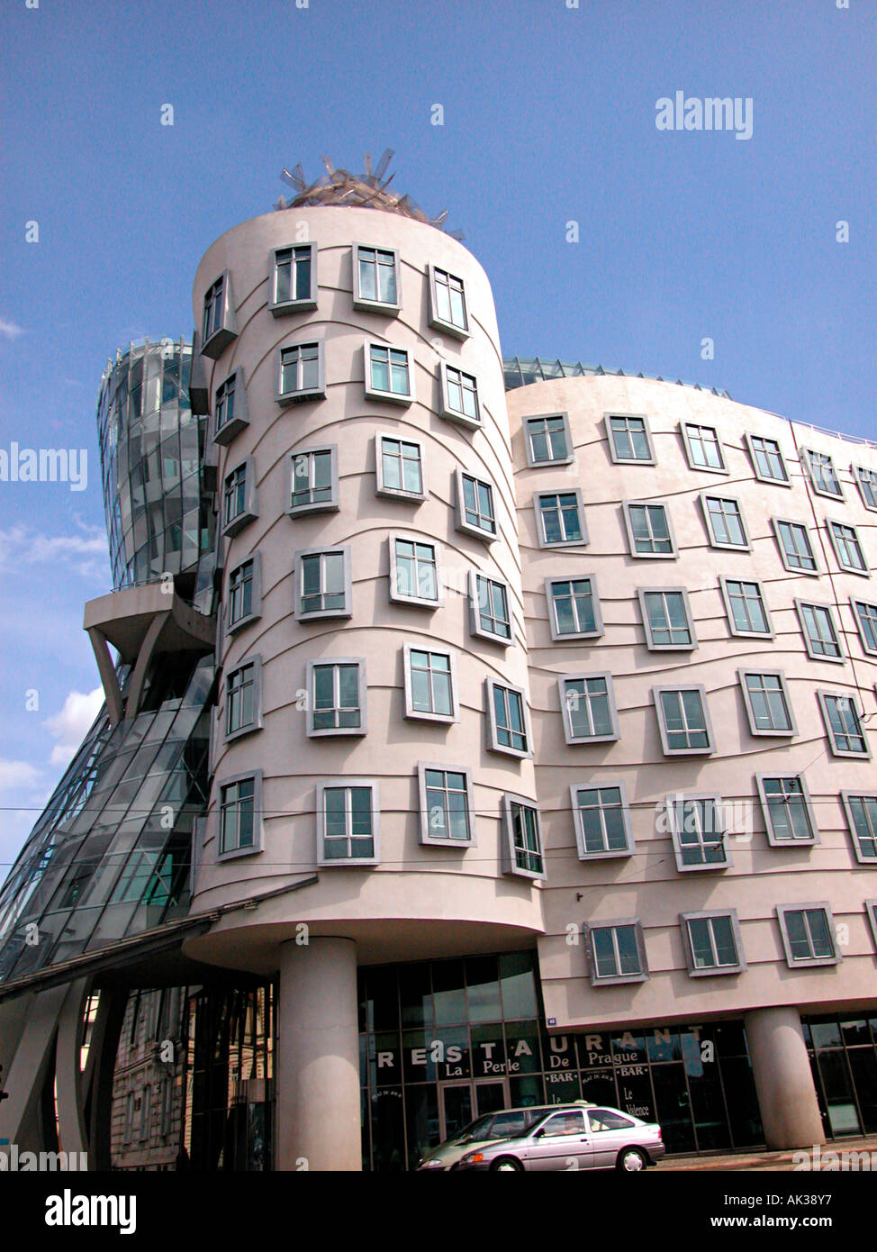 Frank Gehry's Rasin Building, known as Fred and Ginger (after Astair and Rogers) looking as though they are dancing together. Prague. Czech Rep. Stock Photo