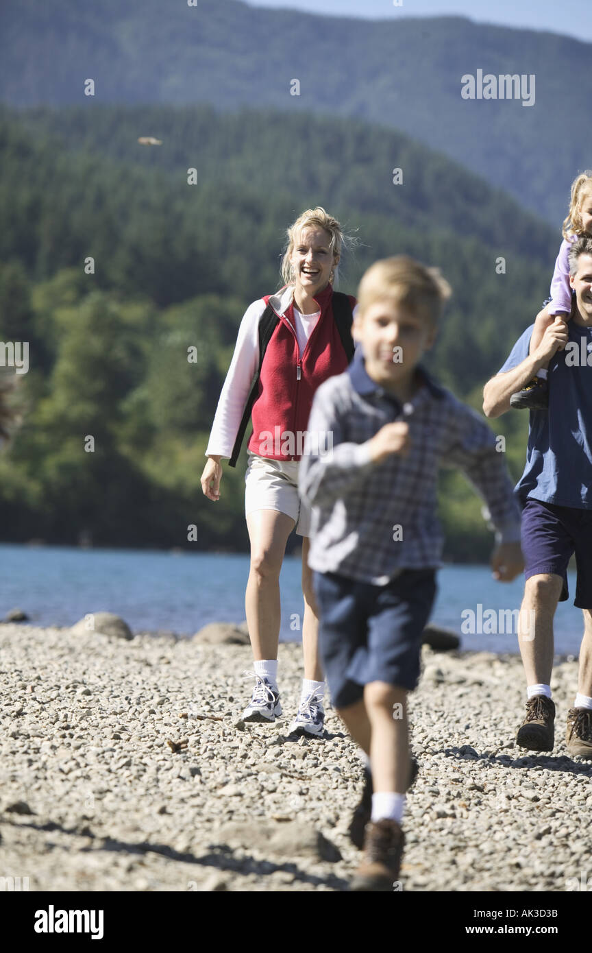 Family hiking near a lake Stock Photo