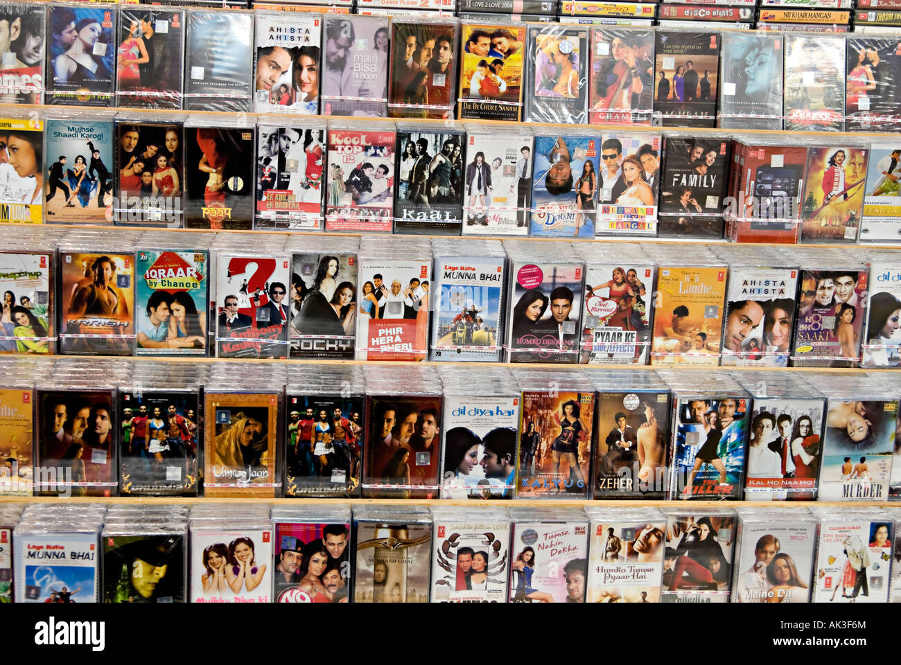 rows of asian music on tape and cd lined up in the traditional style often found in most asian music retailers in the uk Stock Photo