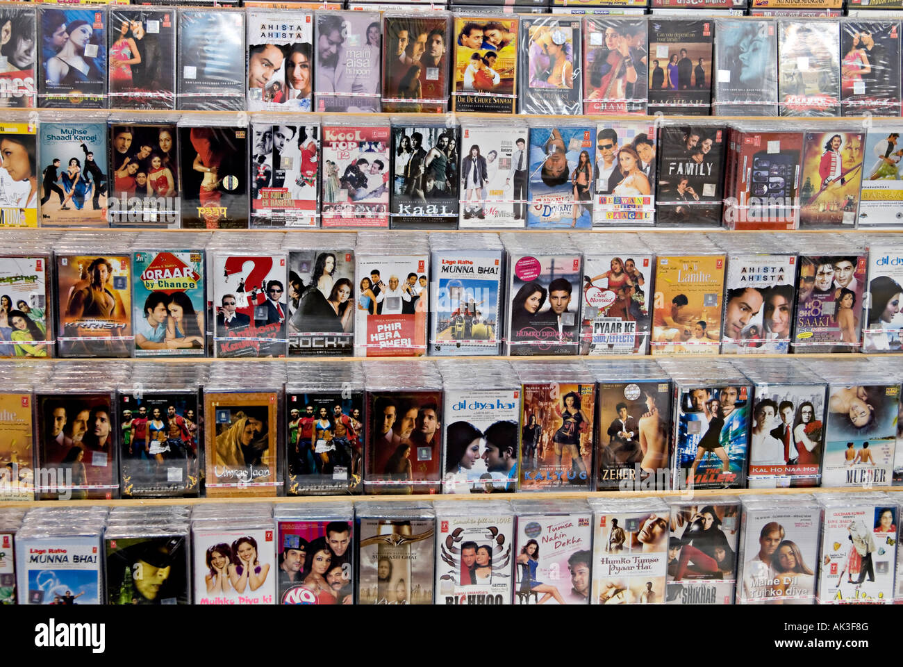 rows of asian music on tape and cd lined up in the traditional style often found in most asian music retailers in the uk Stock Photo