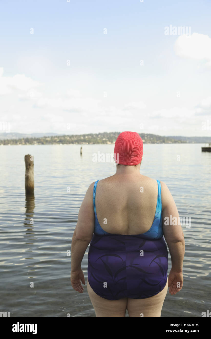 Rear view of a large woman in a bathing suit Stock Photo
