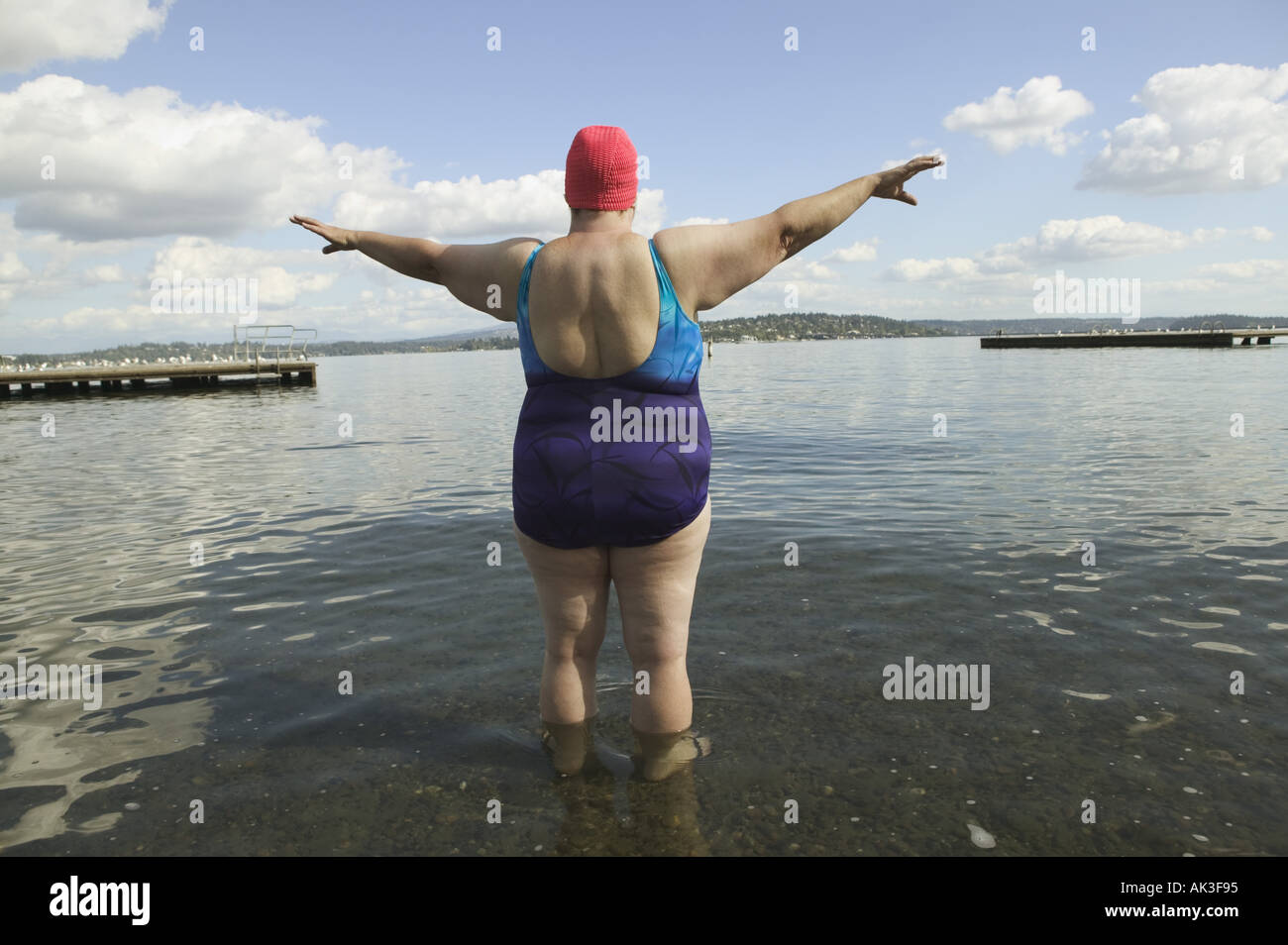 Rear view of a large woman in a bathing suit Stock Photo