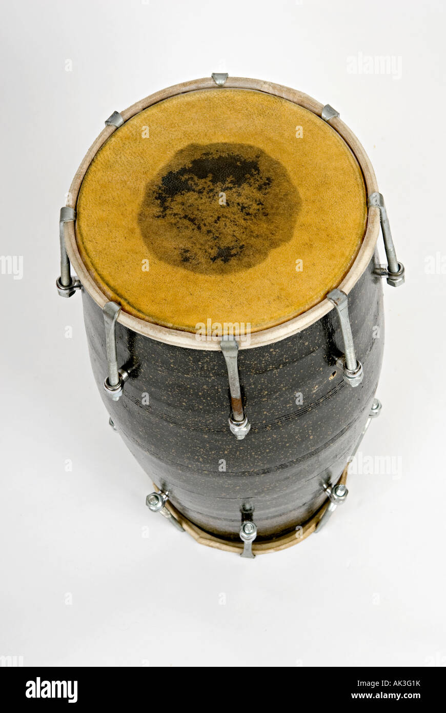 large dhol drums on a white background often used by indian bhangra drummers Stock Photo