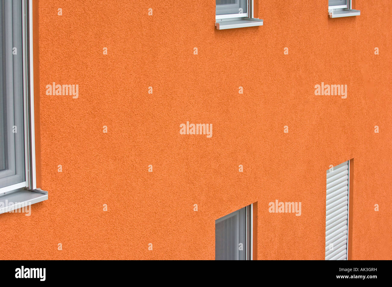 orange front houseplaster buried concealed threecoat render paint on