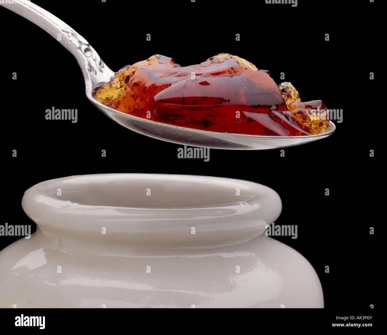 serving a spoonful of jelly Stock Photo Alamy