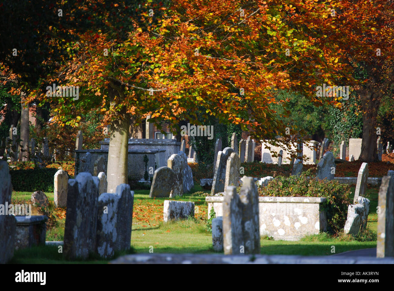 St.Thomas Church graveyard in autumn, Lymington, Hampshire, England, United Kingdom Stock Photo